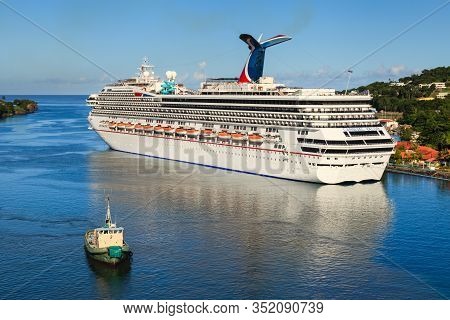 Castries, St Lucia - November 7: Cruise Ship Carnival Valor Docked In Castries On November 7, 2013. 