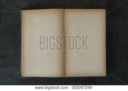 Antique Hardcover Book With Blank Pages. Old Yellow Paper Background Design Element To Place Your Im