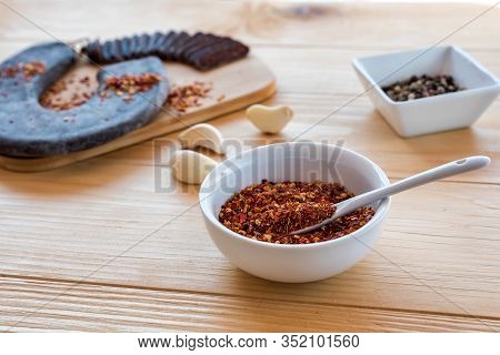 Spicy And Hot Crushed Dried Chili Peppers In White Bowl - Tucana Ljuta Paprika In Front Of Special I