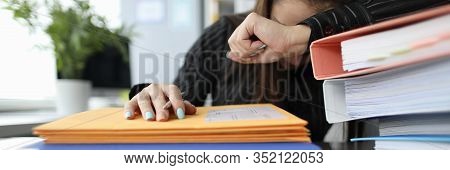 Close-up Of Stressed Female Feeling Dizzy With Workload. Lots Of Paperwork And Problems At Workplace
