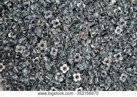 Furniture Nut Persistent M6 Galvanized White In Bulk Closeup In The Studio