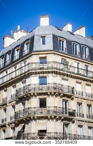 Paris/france - September 3, 2019 : Traditional Haussmann Building And French Flag View From A Parisi