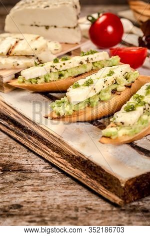 Bruschetta With Avocado, Cheese. The Concept Of Eco Products. Organic Farm Dairy Products, Cheeses, 