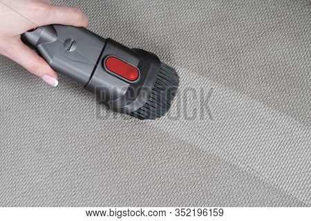 Female Hand Removing Dirt From Sofa With Upholstery Cleaner. Sofa Chemical Cleaning. Upholstered Fur