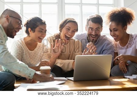 Five Multi-ethnic Friends Make Videocall Looking At Laptop Screen