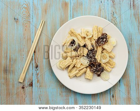 Spicy Chinese Or Korean Yuba Tofu Bamboo And Oyster Mushrooms On Wooden Background.