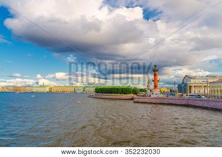 Strelka Arrow Of Vasilyevsky Island With Green Trees And Rostral Columns, Colorful Buildings On Emba