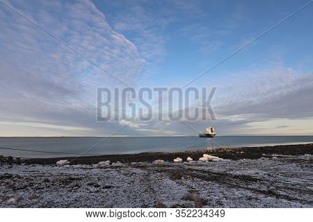 Resupply Cargo Barge On The Waters Of Nunavut Near The Community Of Arviat In The Kivalliq Region
