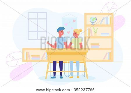 Schoolboys In Love Sit Together At Desk Classroom. Love And Friendship Among Teens. Students Are Sym