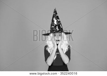 Supernatural Charmer Gray Hair. Kid Enchantress Orange Background. Happy Halloween. Magic Fantasy. S