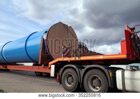 A Truck With A Special Semi-trailer For Transporting Oversized Loads. Oversize Load Or Exceptional C