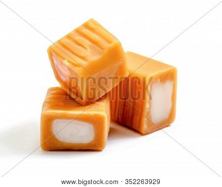 Cream Toffee Caramel  Group With   Milk Filling Close-up Isolated On White Background