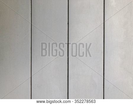 The Surface Of A Gray Wooden Table.