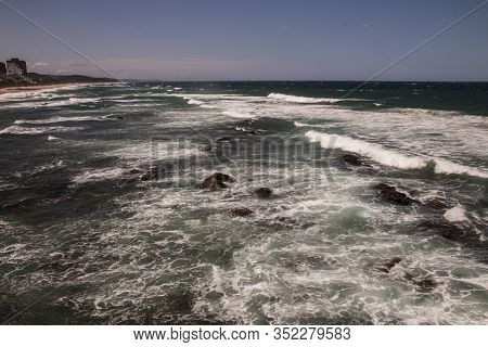 White Water Caused By Rocks In Shallows