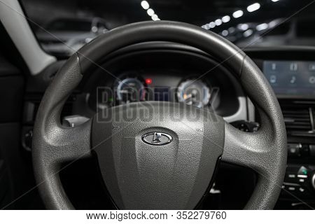 Novosibirsk, Russia - January 24, 2020:  Lada Priora, Dashboard, Player, Steering Wheel With Logo An