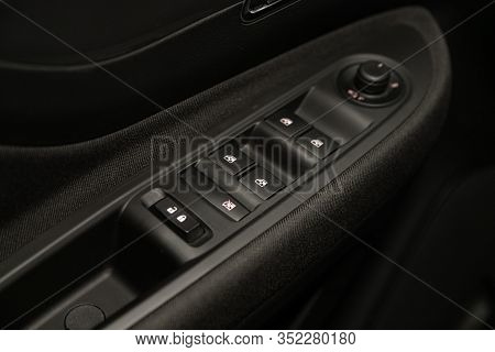 Novosibirsk, Russia - January 11, 2020:   Opel Mokka, Close-up Of The Side Door Buttons: Window Adju