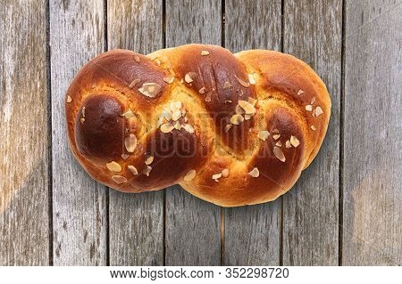 Sweet Bread, Easter Greek Tsoureki Braid On Wood Background