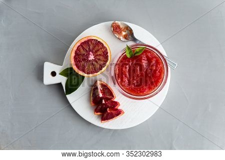 Homemade Orange Jam From Red Oranges In A Plate. Natural, Healthy Food. Top View, Light Background, 