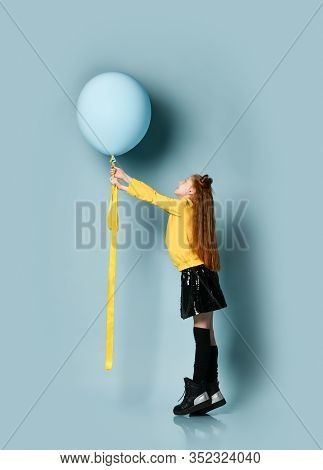 Ginger Teenage Female With Fancy Hairstyle, In Yellow Sweatshirt, Black Skirt, Knee-highs, Boots. Sh
