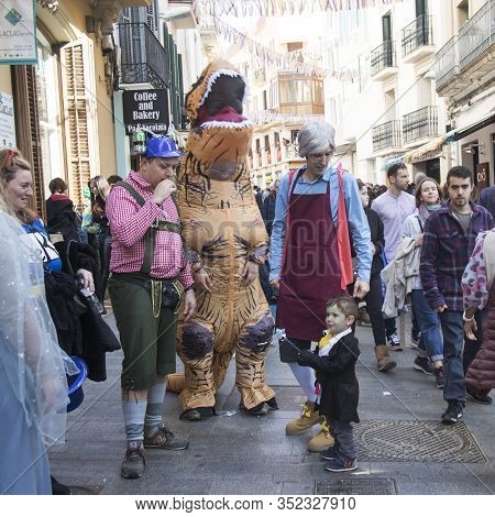 Sitges, Spain - February 23, 2020: People At Last Day Of Sitges Carnival. Burial Carnestoltes - 
