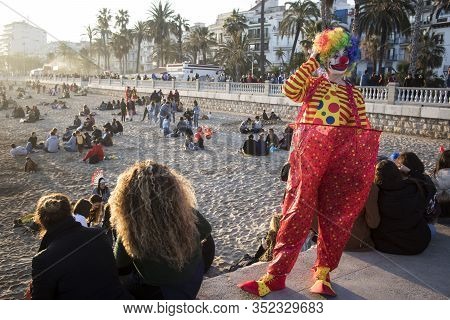 Sitges, Spain - February 23, 2020: People At Last Day Of Sitges Carnival. Burial Carnestoltes - 