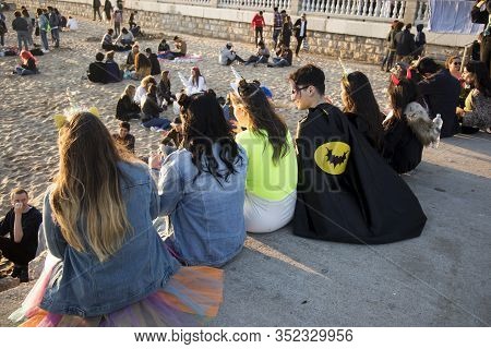 Sitges, Spain - February 23, 2020: People At Last Day Of Sitges Carnival. Burial Carnestoltes - 