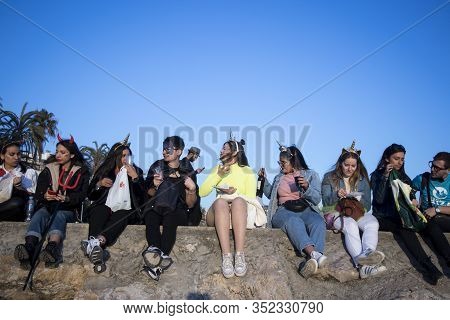 Sitges, Spain - February 23, 2020: People At Last Day Of Sitges Carnival. Burial Carnestoltes - 