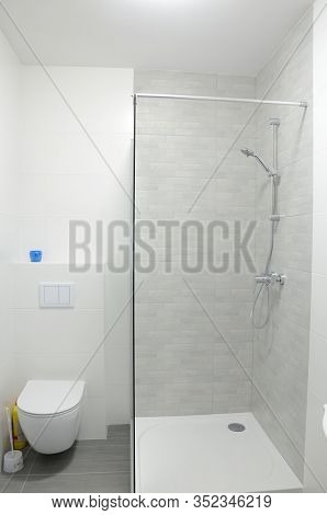 Bathroom With Walk-in Shower In New Apartment In Wroclaw, Poland. Studio Type Apartment With Area Of