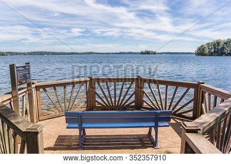 Plon, Germany - June 24, 2019: Blue Bench At The Educational Planetenpfad In Plon, Germany