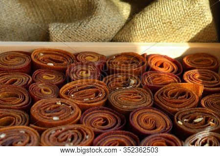 Sweet Pureed Fruit Pastille. Fruit Roll-ups Homemade. Natural Sweets From Dried Berries And Fruits. 