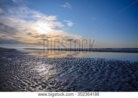 Dutch Landscape, North Sea Sandy Beach During Low Tide Near Castricum Aan Zee, Winter In Netherlands