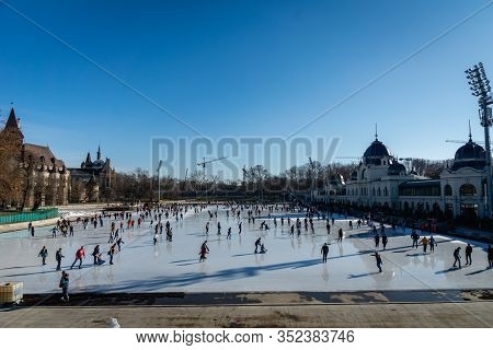 Budapest, Hungary - February 2020: City Park Ice Rink And People Skating In Budapest, Hungary. City 