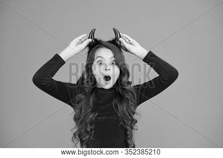 What Is That On My Head. Small Child Red Horns. Cute Imp. Trick Or Treat. Happy Halloween. Scared Li