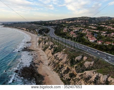 Aerial View Of Newport Beach Small Road Next To The Cliff During Sunset Twilight In Southern Califor