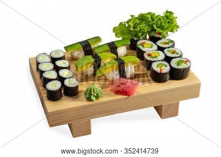 Fresh Avocado Sushi with Kappa cheese and vegetarion rolls on wooden board isolated on white background