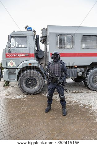 Samara, Russia - February 23, 2020: Special Forces Soldier Of Rosgvardia In Uniform With Rifle And H