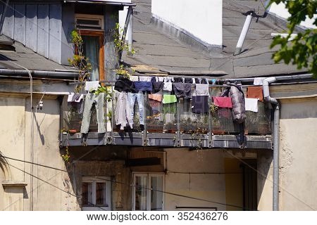 Drying Things On The Balcony Or Railing Is An Old Way To Dry Things. The Unfolding Of Things In The 
