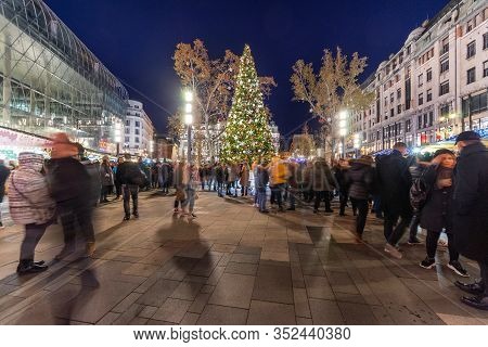 Budapest, Hungary - November 30, 2019: People On The Street At Vorosmarty Square With Christmas Shop