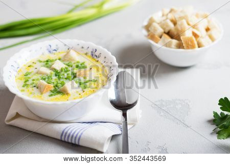 Creamy Potato Soup With Croutons And Fresh Herbs