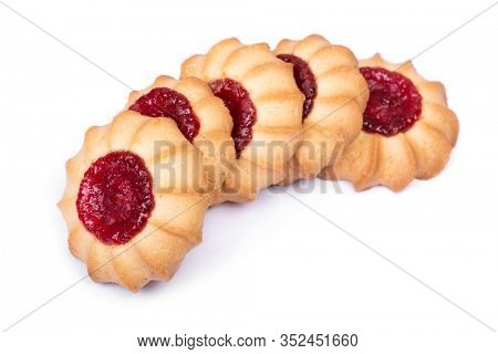 Group of shortbread cookies with a drop of jam, curabier dessert isolated on white background