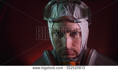Man In Protective Costume Suit, Gas Protect Medical Spray Paint Mask. Doctor In Respirator. Concept 