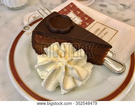 Vienna, Austria- August 15, 2019: Original Sacher Torte Cake At Hotel Sacher In Vienna. Ready To Eat