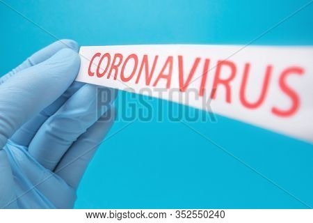 Coronavirus Print On Blue Medical Background. Covid-19 - Wuhan Novel Coronavirus Pneumonia Covid-19.