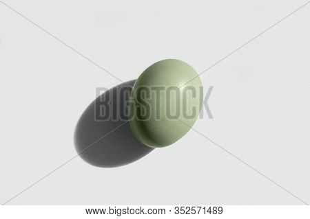 Araucana Egg Isolated On White Background. Blue Or Green Eggs From Araucana Chicken