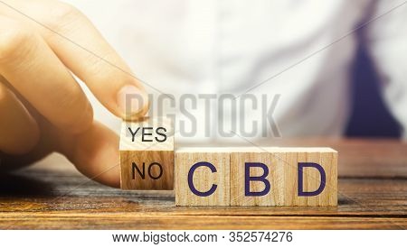 Wooden Blocks With The Word Cbd. Marijuana, Cannabis, Hemp. Concept Of Cannabidiol