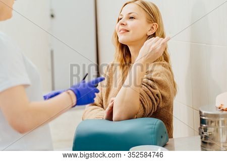Laboratory Nurse Takes Real Blood Sample, Phlebotomist, With Vacuum Capsule For Analysis Test From P