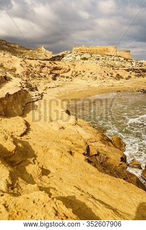 Castle San Ramon Above Beach Of El Playazo, Cabo De Gata Nijar, Province Almer