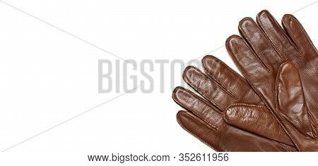 Brown Classic Leather Mens Gloves On White Isolated Background Top View. Stylish Fashionable Winter 
