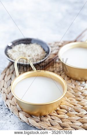 Makgeolli Rice Wine Is One Of The Oldest Korean Traditional Fermented Alcoholic Drinks Close-up. Hea