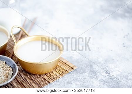 Makgeolli Rice Wine Is One Of The Oldest Korean Traditional Fermented Alcoholic Drinks Close-up. Hea